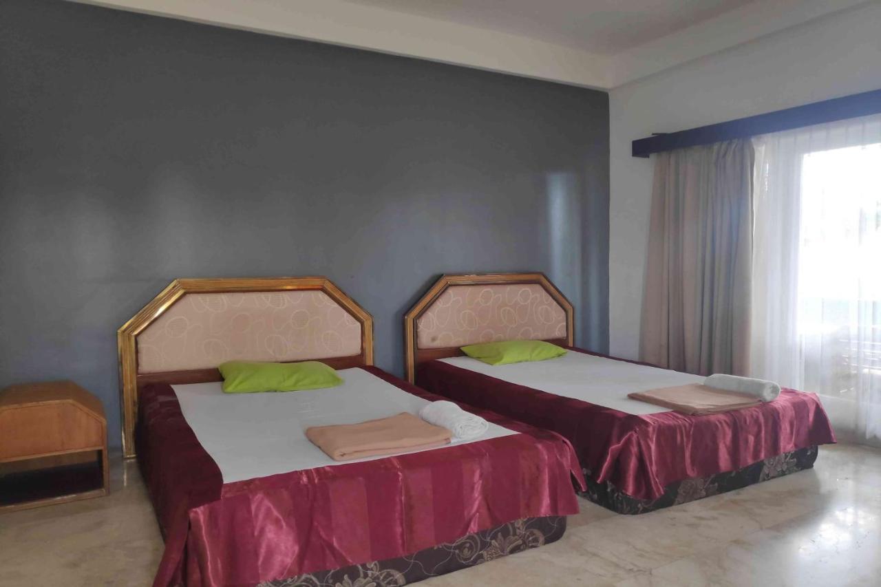 Pecatu Guesthouse อูลูวาตู ภายนอก รูปภาพ