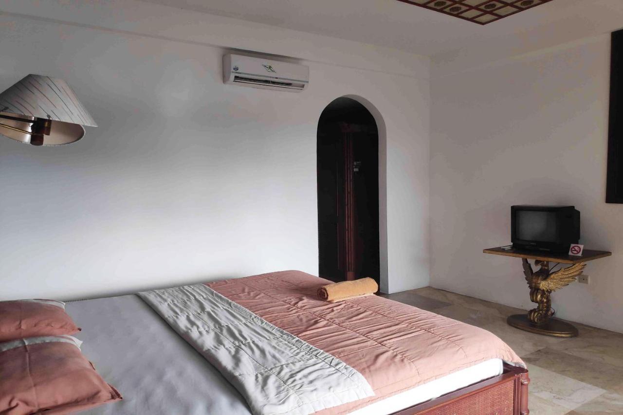 Pecatu Guesthouse อูลูวาตู ภายนอก รูปภาพ