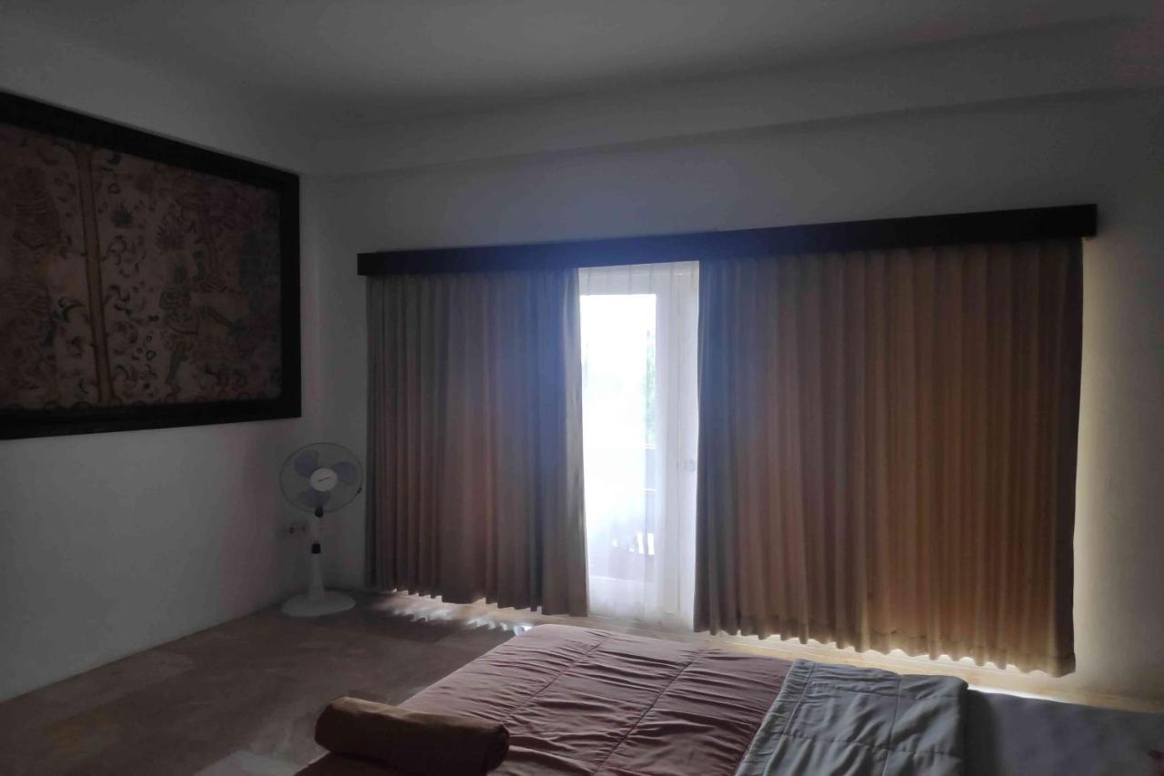 Pecatu Guesthouse อูลูวาตู ภายนอก รูปภาพ